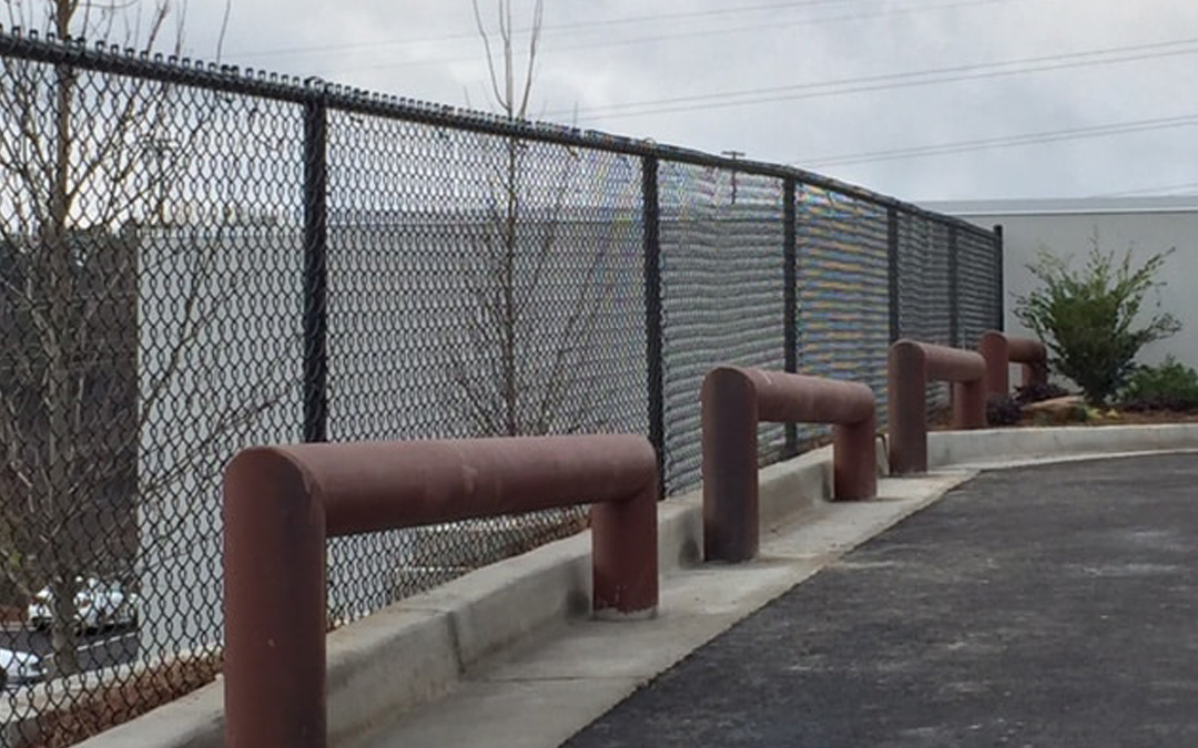 Security barrier fence for car dealership